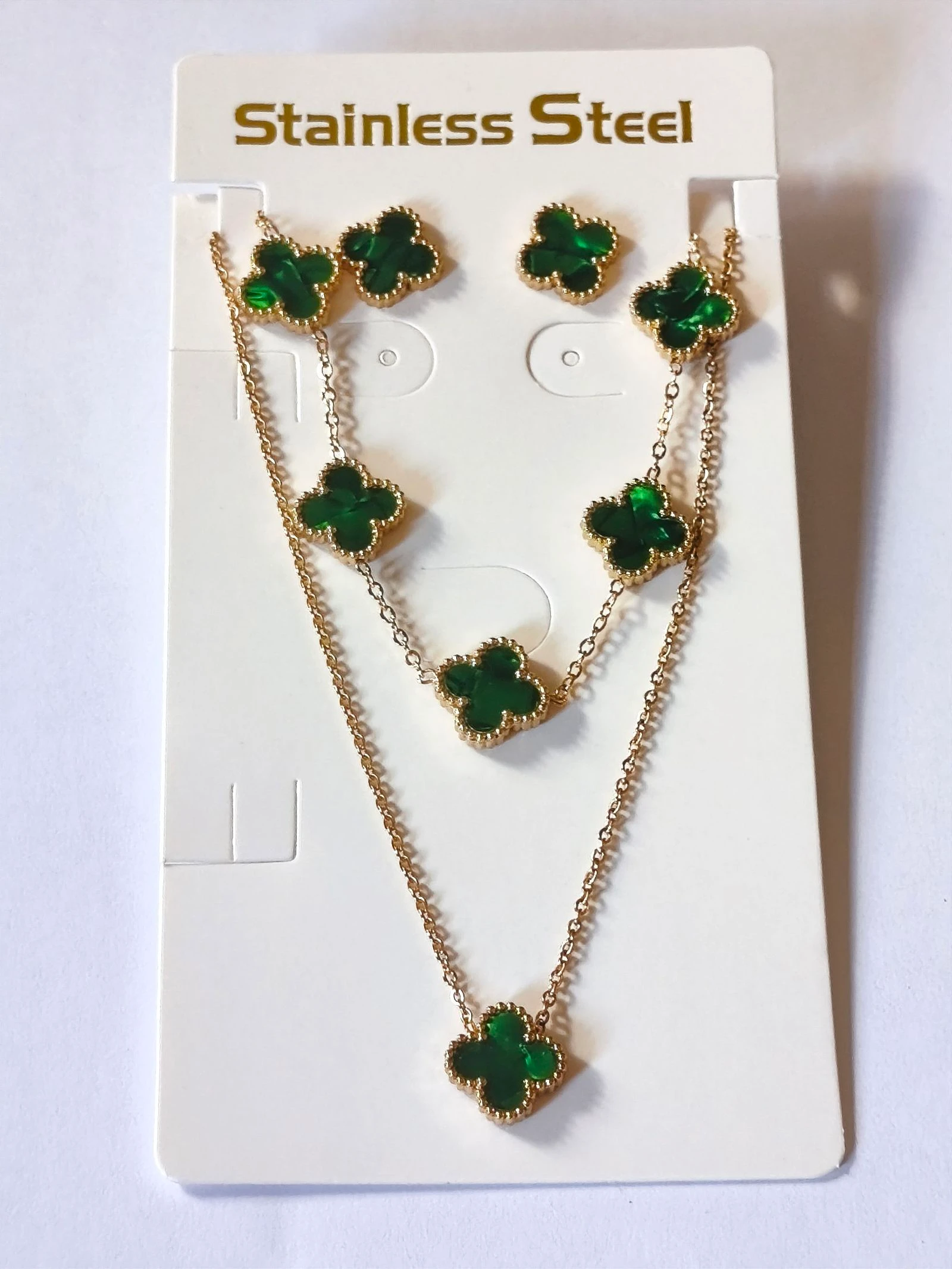 Conjunto de gargantilla pulsera y pendientes de trébol verde luminoso con cadena dorada inalterable